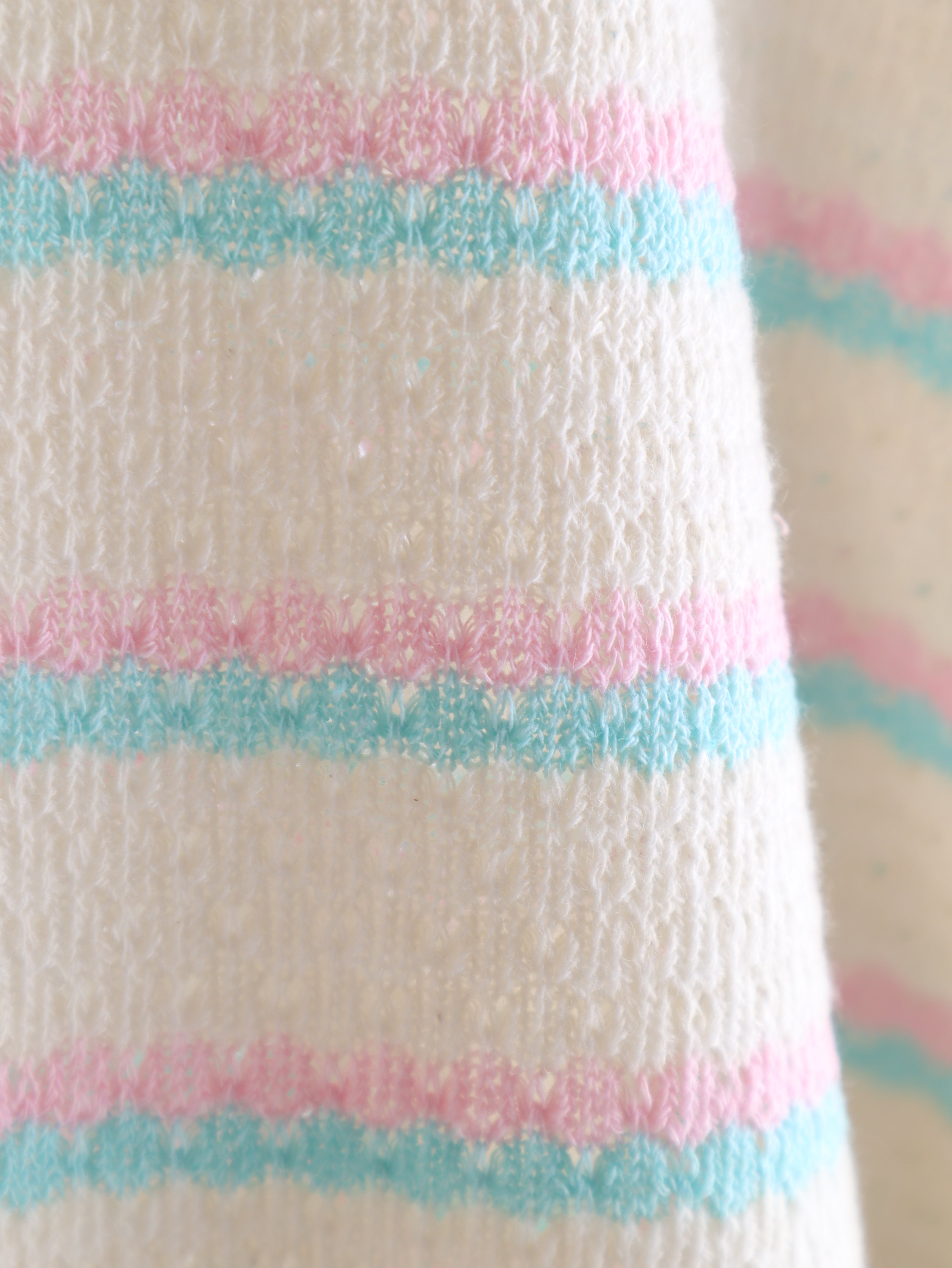 Oversize Strick-Poloshirt mit Pastell-Streifen